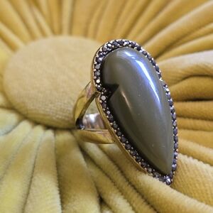 Gold ring with green stone